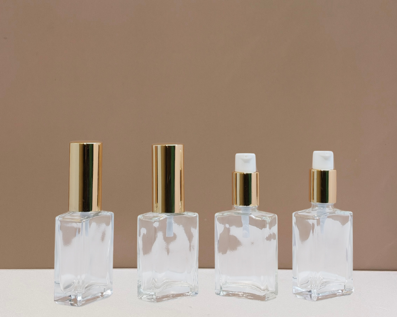 30ml Rectangle Glass Bottle with Gold Treatment Pump