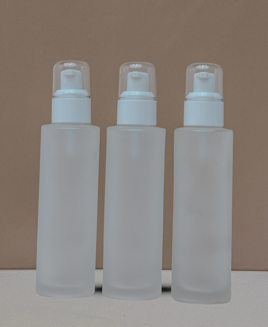 100Ml Glass Bottle With White Treatment Pump (Flat)
