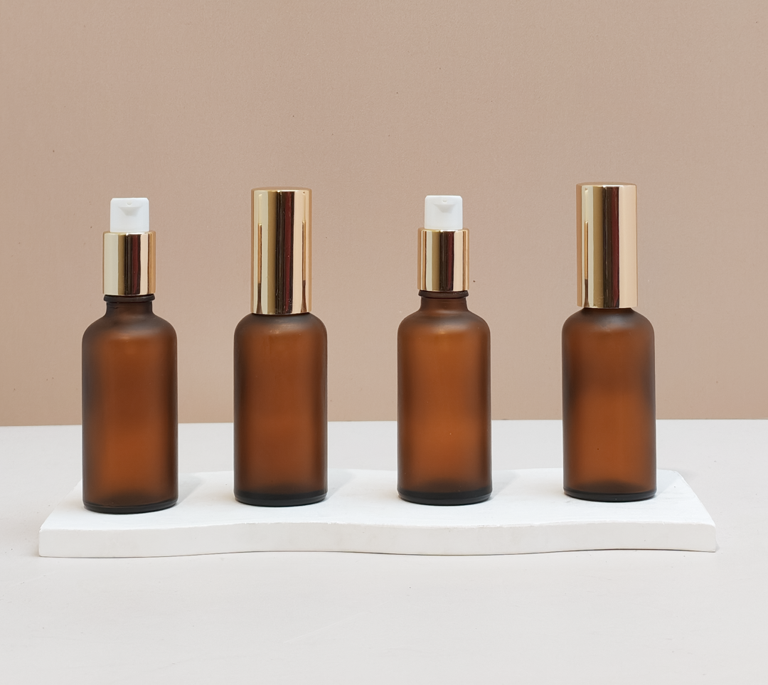 50Ml Glass Bottle With Gold Treatment Pump (Round)