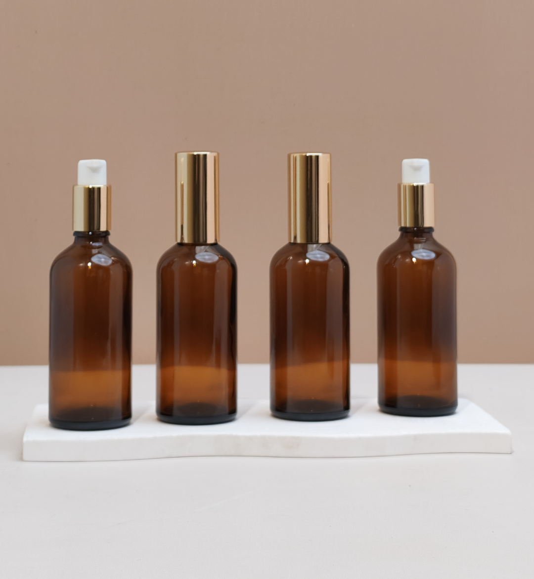 100ml Glass Bottles with Gold Treatment Pump