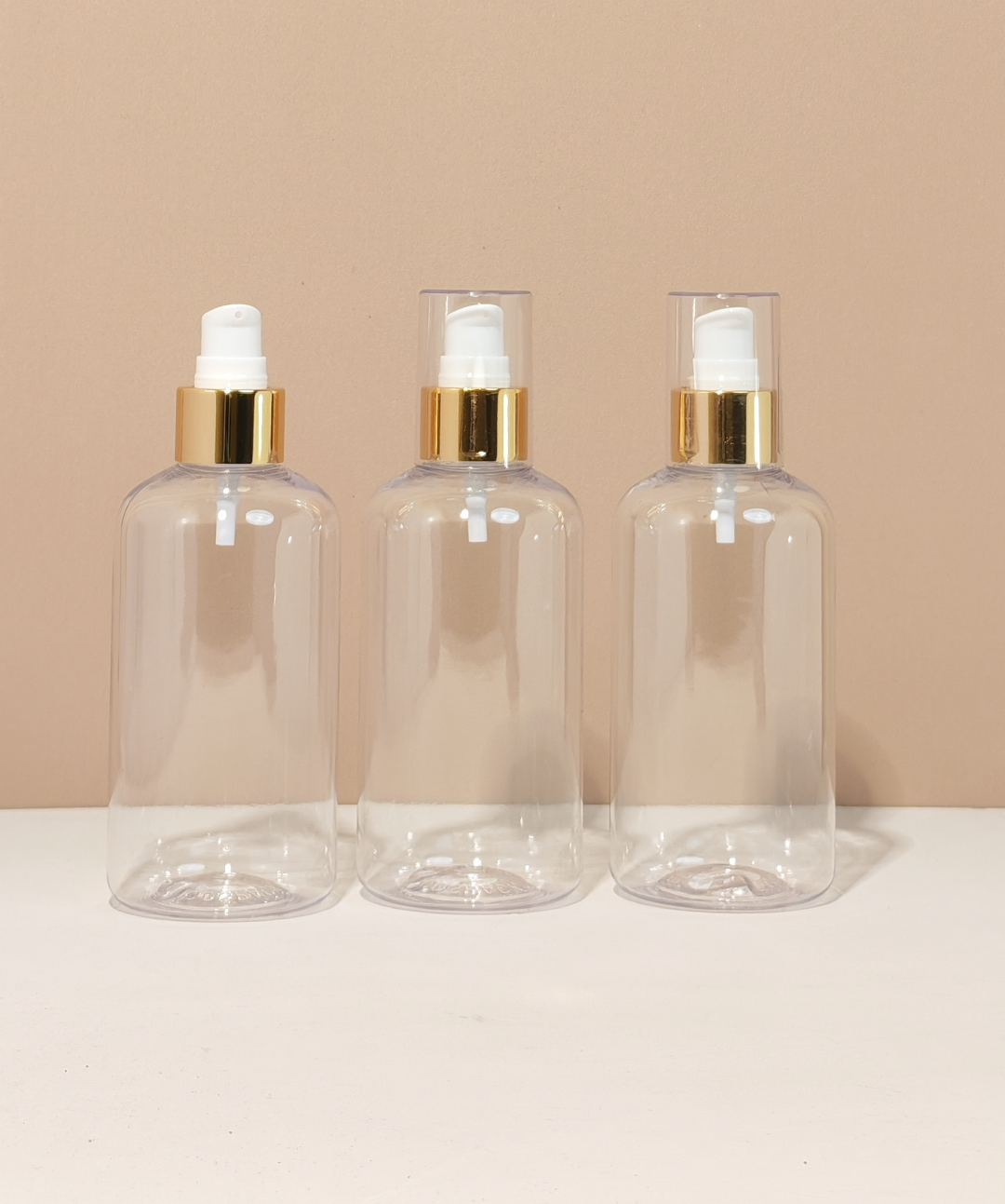 250Ml Short Pet Bottle With Gold Treatment Pump