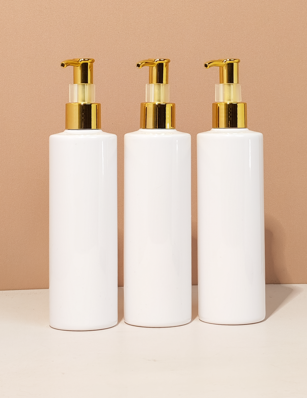 250Ml Tall Pet Bottle With All Gold Lotion Pump