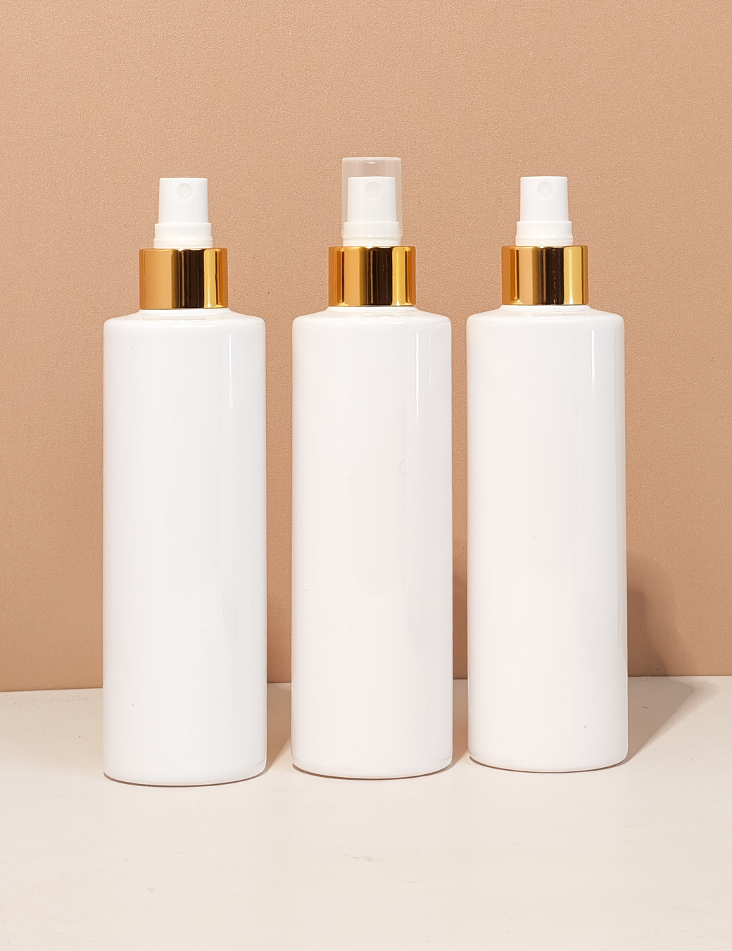 250Ml Tall Pet Bottle With Gold Mist Spray