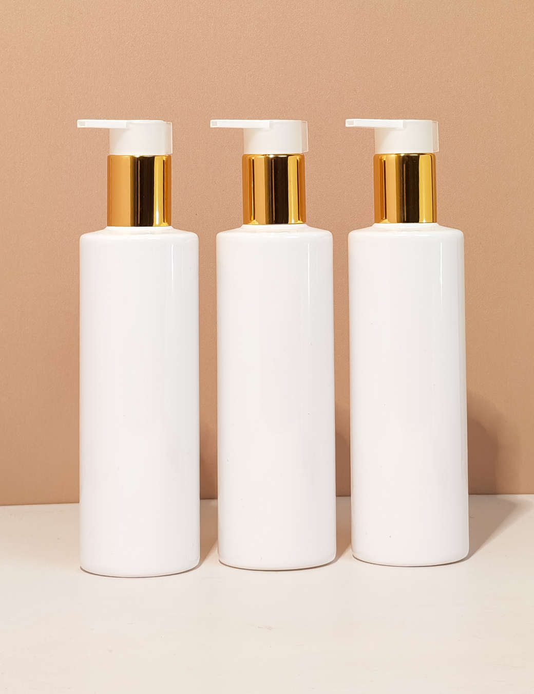 250Ml Tall Pet Bottle With New Gold White Lotion Pump