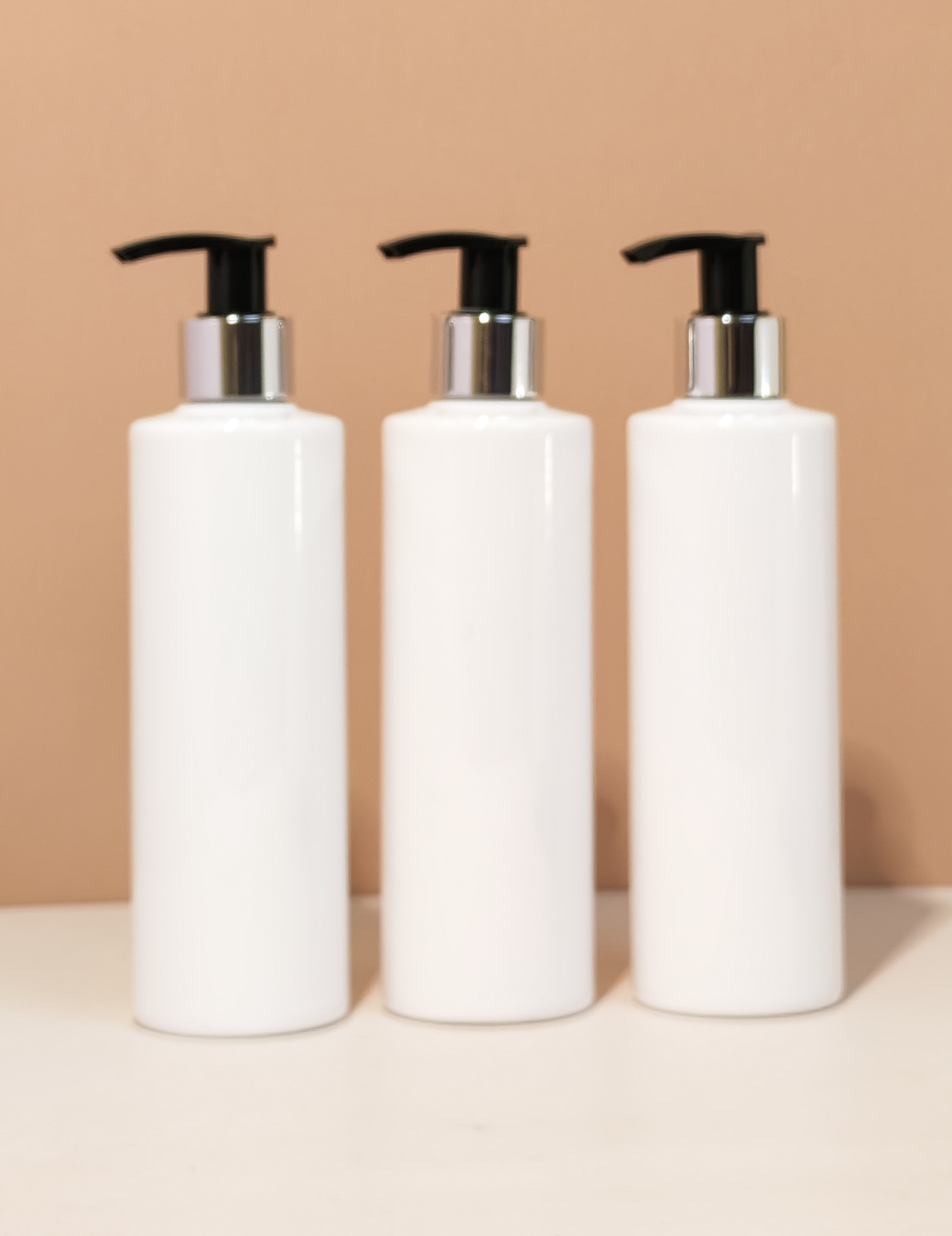 250Ml Tall Pet Bottle With Silver Black Lotion Pump