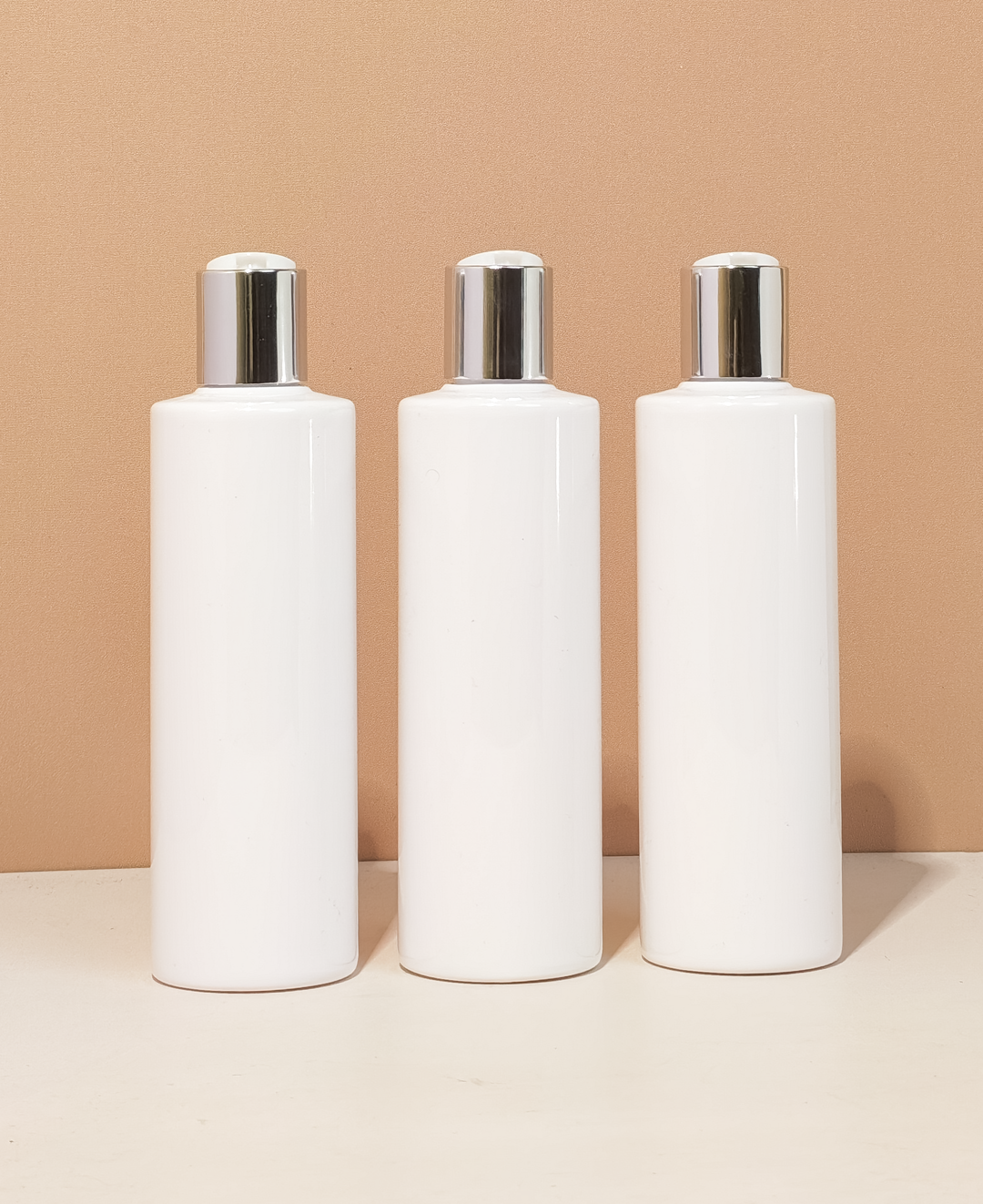 250Ml Tall Pet Bottle With Silver Press Cap