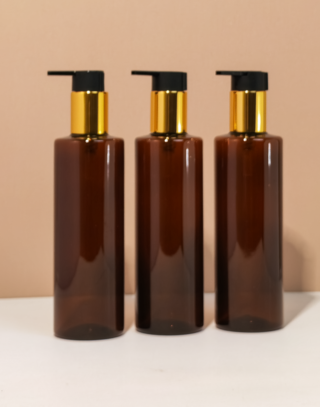 250Ml Tall Pet Bottle With New Gold Black Lotion Pump