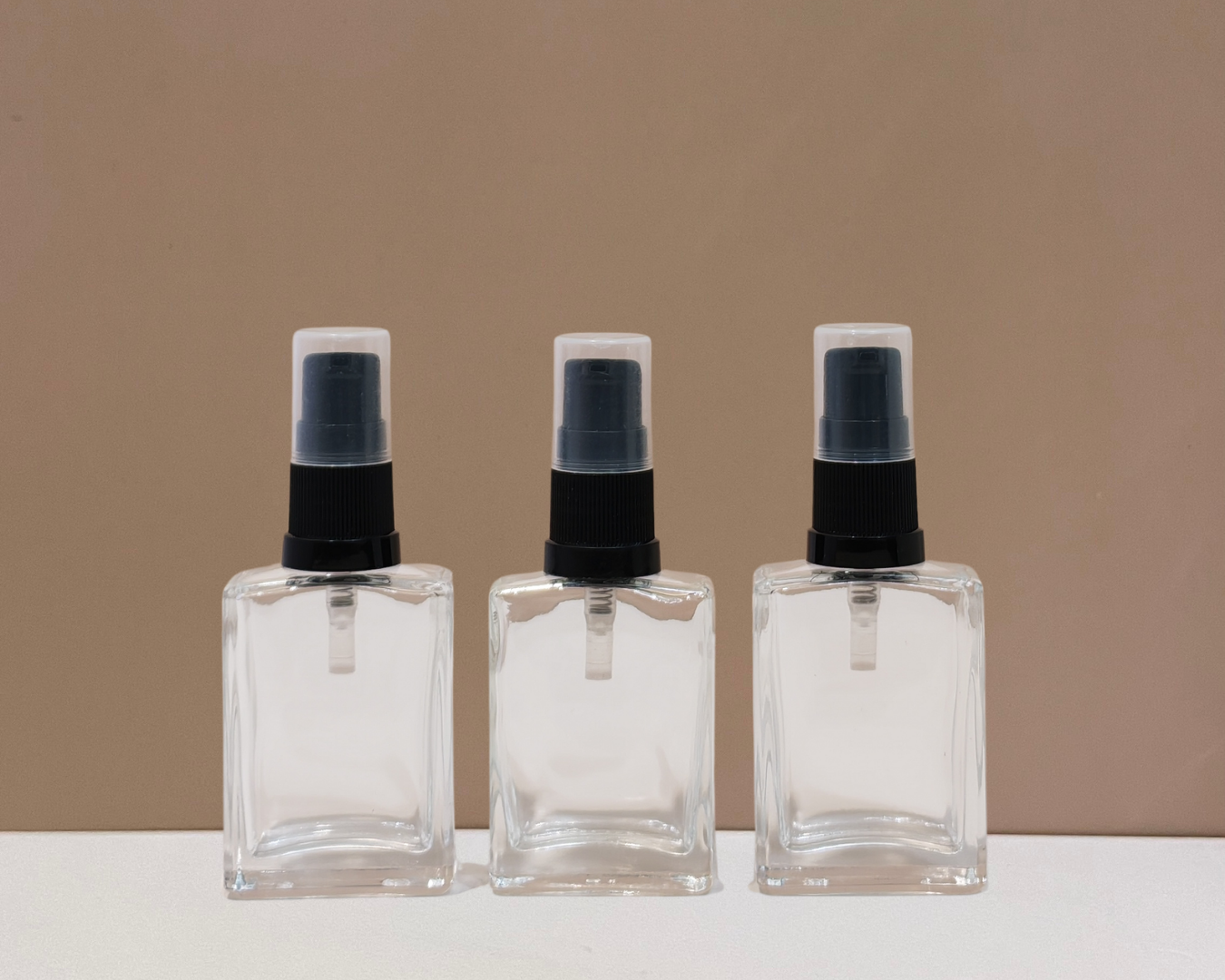 30ml Rectangle Glass Bottle with Black Treatment Pump