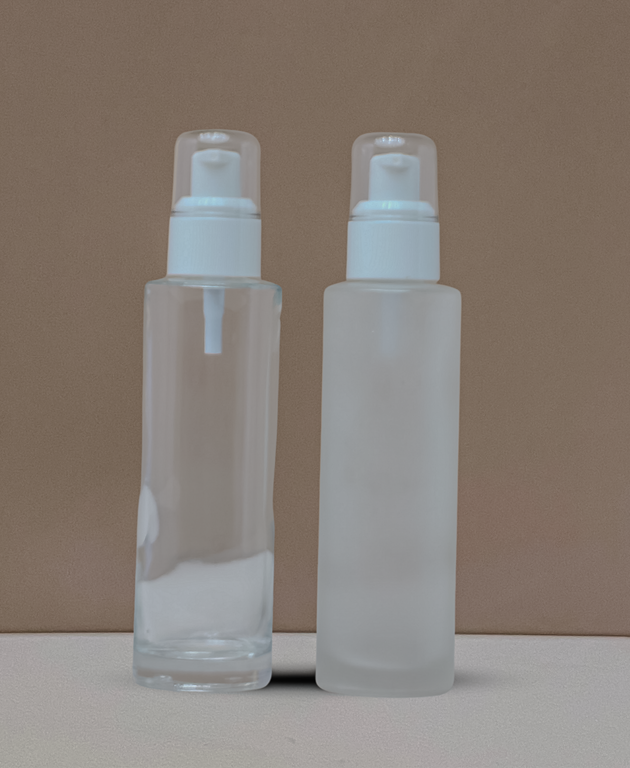 100Ml Glass Bottle With White Treatment Pump (Flat)