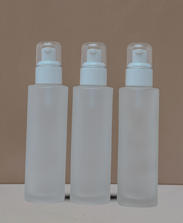 100Ml Glass Bottle With White Treatment Pump (Flat)
