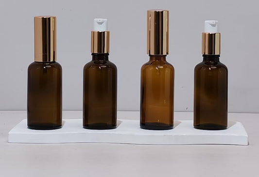 50Ml Glass Bottle With Gold Treatment Pump (Round)