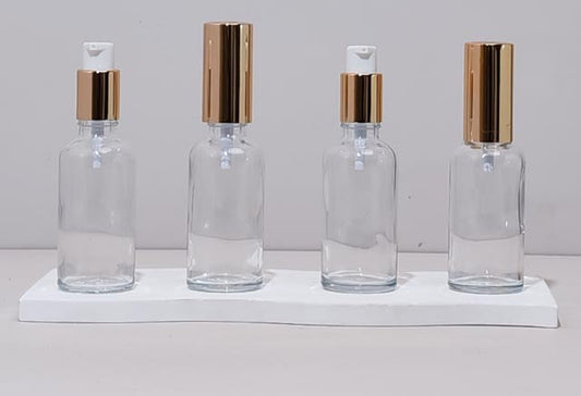 50Ml Glass Bottle With Gold Treatment Pump (Round)