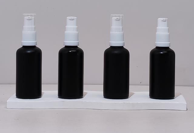 50Ml Glass Bottle With White Treatment Pump (Round)