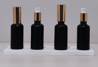 50Ml Glass Bottle With Gold Treatment Pump (Round)