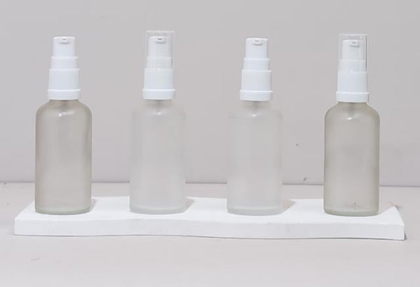 50Ml Glass Bottle With White Treatment Pump (Round)