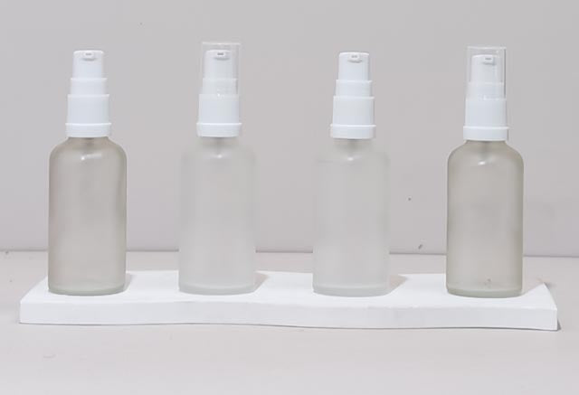 50Ml Glass Bottle With White Treatment Pump (Round)