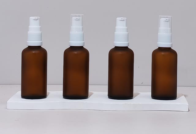 50Ml Glass Bottle With White Treatment Pump (Round)