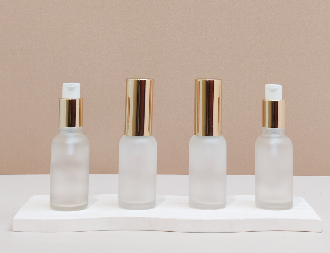 30ml Glass Bottle with Gold Treatment Pump