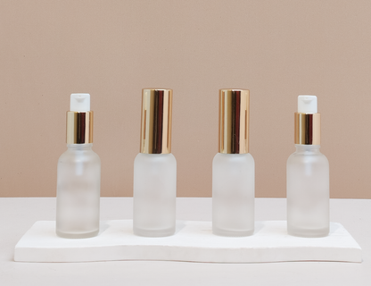 30ml Glass Bottle with Gold Treatment Pump