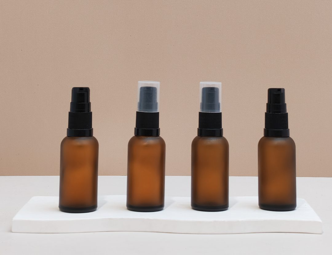 30Ml Glass Bottle With Black Treatment Pump (Round)