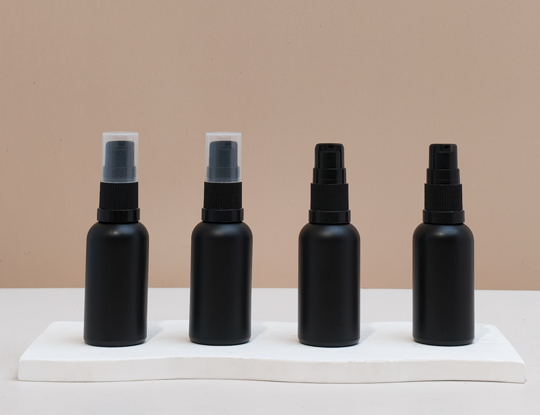 30Ml Glass Bottle With Black Treatment Pump (Round)