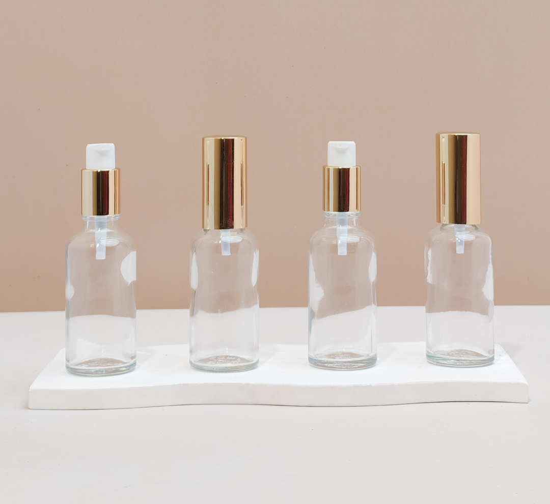 50Ml Glass Bottle With Gold Treatment Pump (Round)