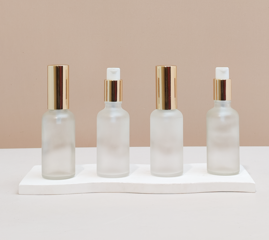 50Ml Glass Bottle With Gold Treatment Pump (Round)