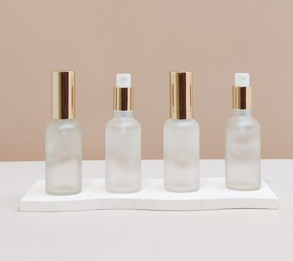 50Ml Glass Bottle With Gold Treatment Pump (Round)