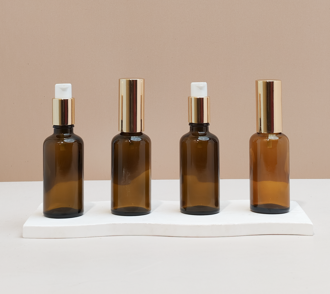 50Ml Glass Bottle With Gold Treatment Pump (Round)