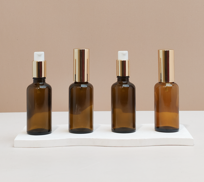 50Ml Glass Bottle With Gold Treatment Pump (Round)