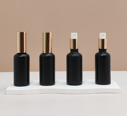 50Ml Glass Bottle With Gold Treatment Pump (Round)