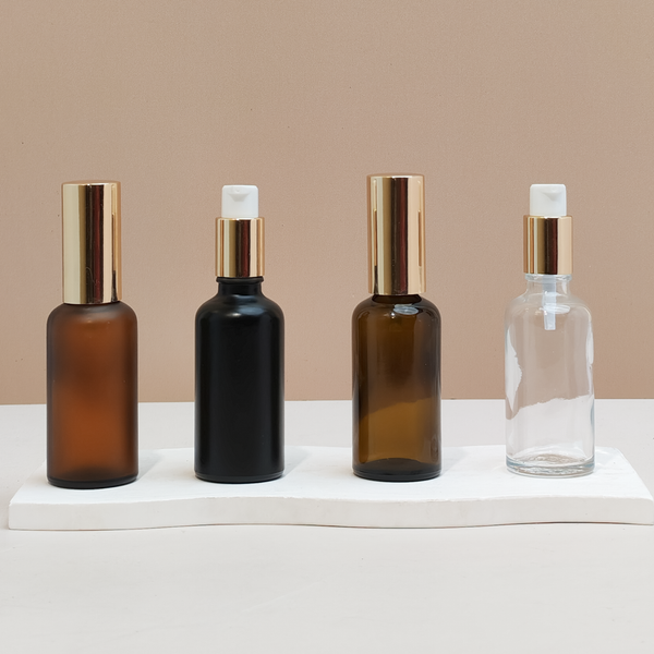 50Ml Glass Bottle With Gold Treatment Pump (Round)