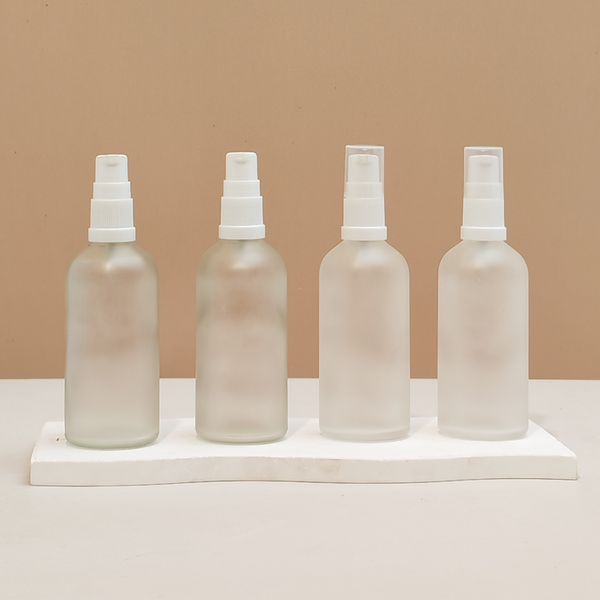100Ml Glass Bottle With White Treatment Pump (Round)
