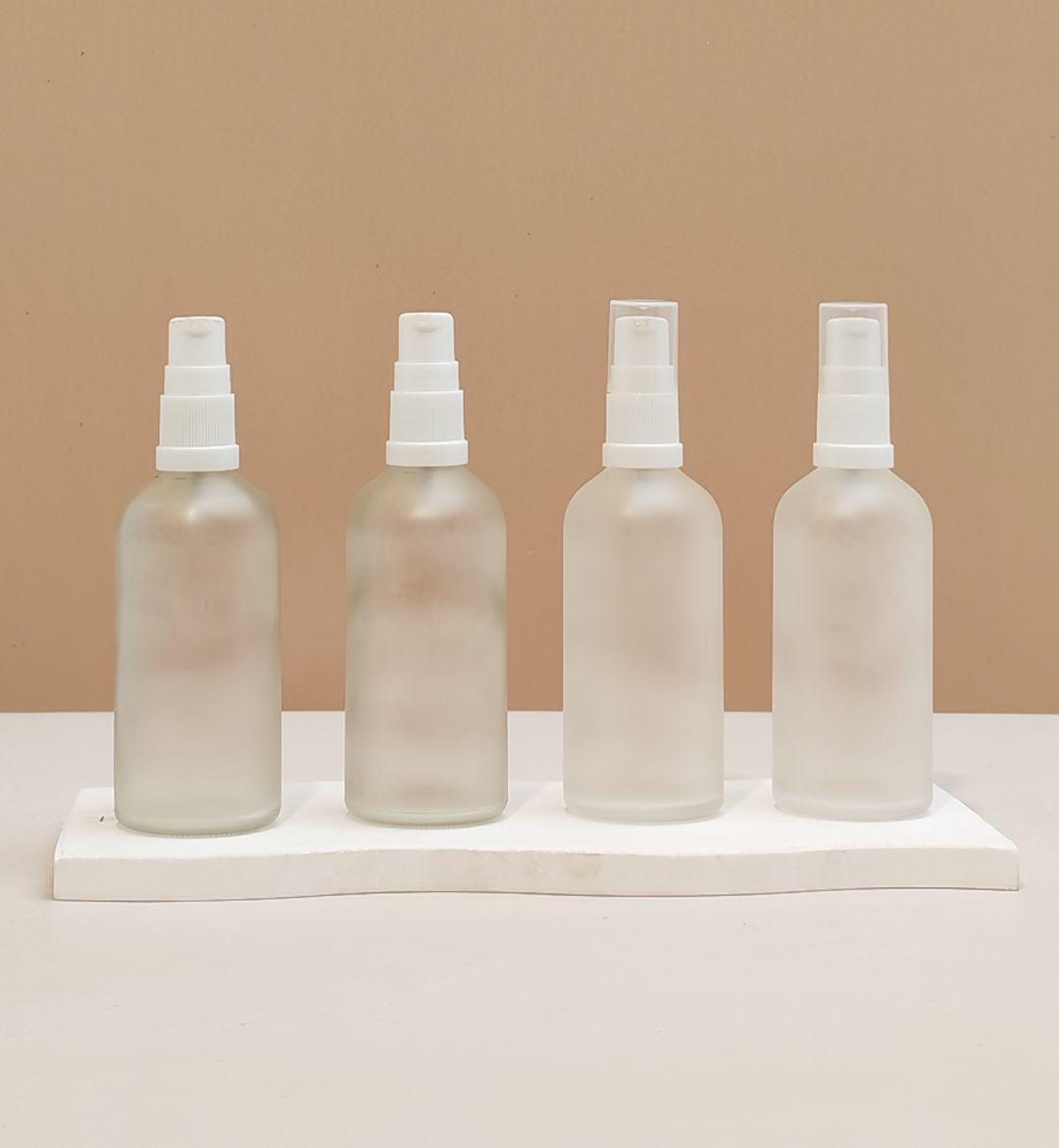 100Ml Glass Bottle With White Treatment Pump (Round)
