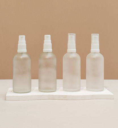 100Ml Glass Bottle With White Treatment Pump (Round)
