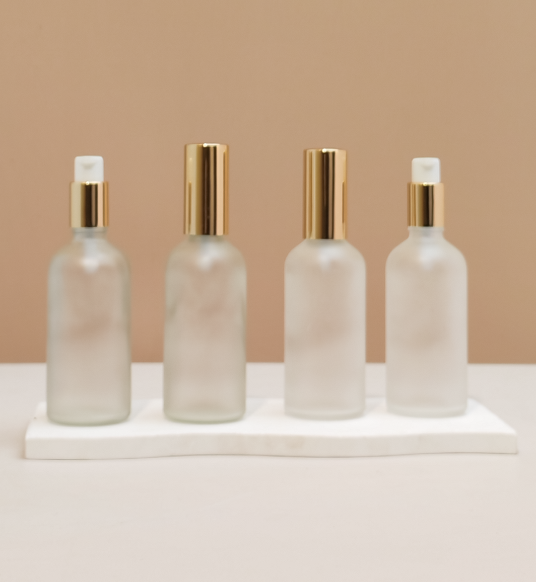 100ml Glass Bottles with Gold Treatment Pump