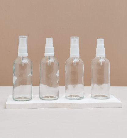 100Ml Glass Bottle With White Treatment Pump (Round)