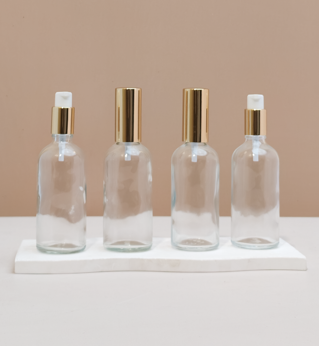 100ml Glass Bottles with Gold Treatment Pump