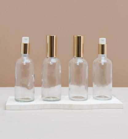 100ml Glass Bottles with Gold Treatment Pump