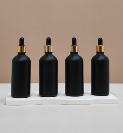 100Ml Glass Bottle With Gold Black Dropper (Round)