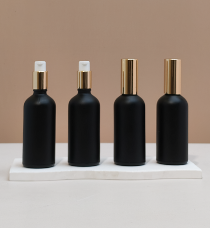 100ml Glass Bottles with Gold Treatment Pump
