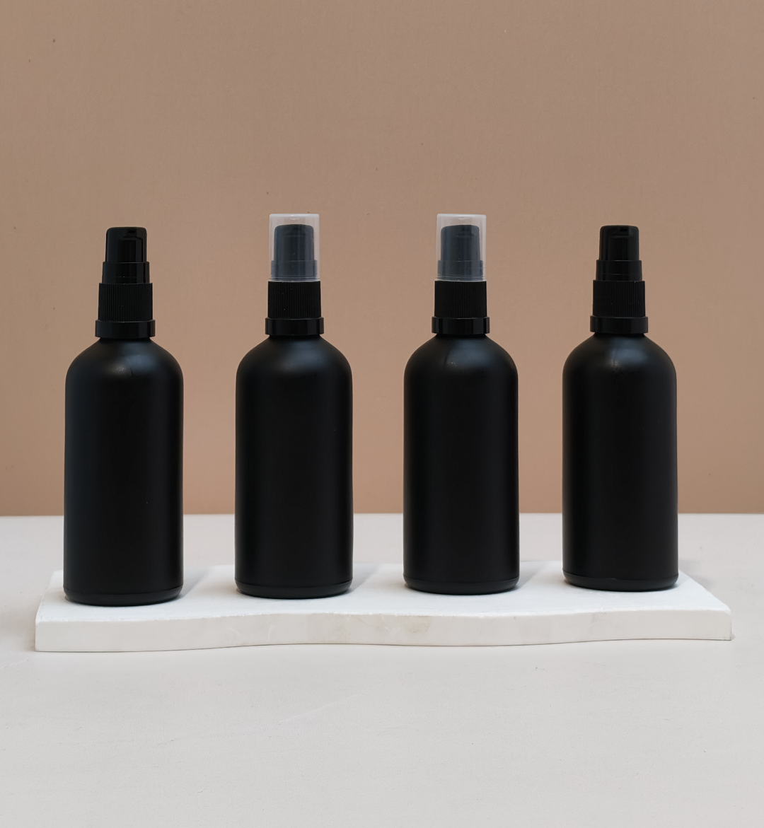100Ml Glass Bottle With Black Treatment Pump (Round)