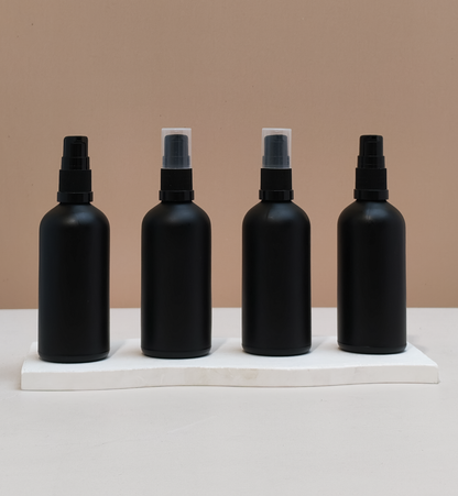 100Ml Glass Bottle With Black Treatment Pump (Round)