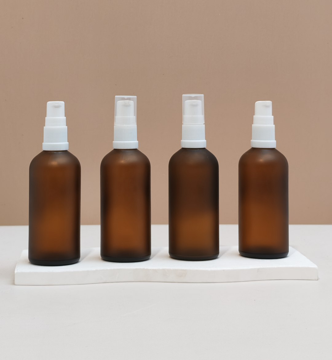 100Ml Glass Bottle With White Treatment Pump (Round)