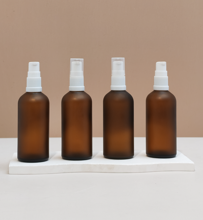 100Ml Glass Bottle With White Treatment Pump (Round)