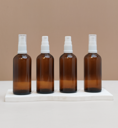 100Ml Glass Bottle With White Treatment Pump (Round)