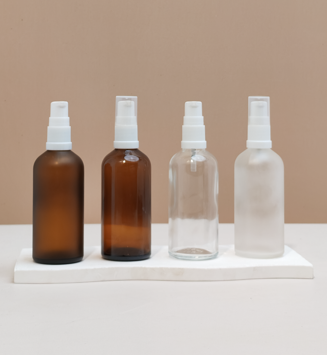 100Ml Glass Bottle With White Treatment Pump (Round)