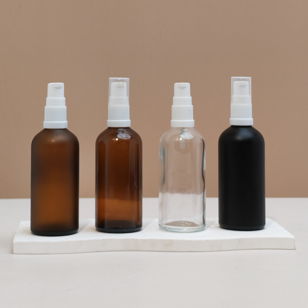 100Ml Glass Bottle With White Treatment Pump (Round)