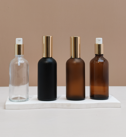 100ml Glass Bottles with Gold Treatment Pump