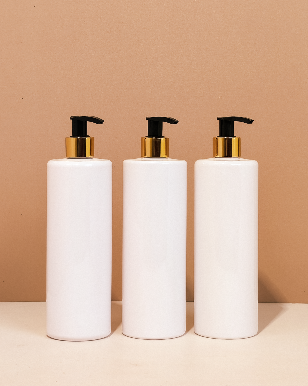 500Ml Tall Pet Bottle With Old Gold Black Lotion Pump